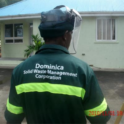 Sanitation worker wearing protective clothing