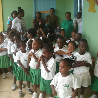 School children and their teachers standing outside