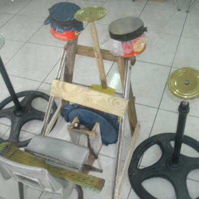 A drum machine made of recycled items