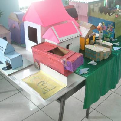 Display of recycled items on a table at the Exhibition