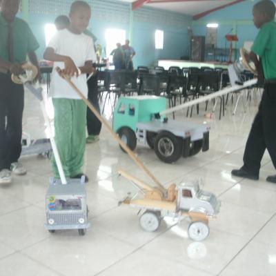Students playing with their hand made toy trucks